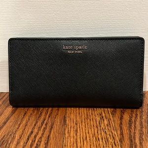 Kate Spade Large Slim Bifold Wallet. New with tags. Black leather.